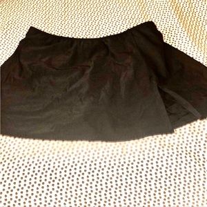 Black Swim FX swim skirt w/ built in bottoms.